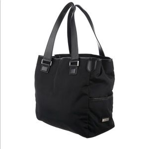 Tumi black nylon and leather tote.